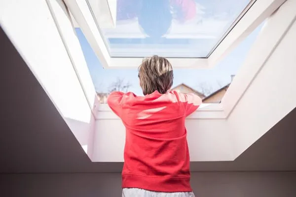 Opening skylight providing natural ventilation in a loft room