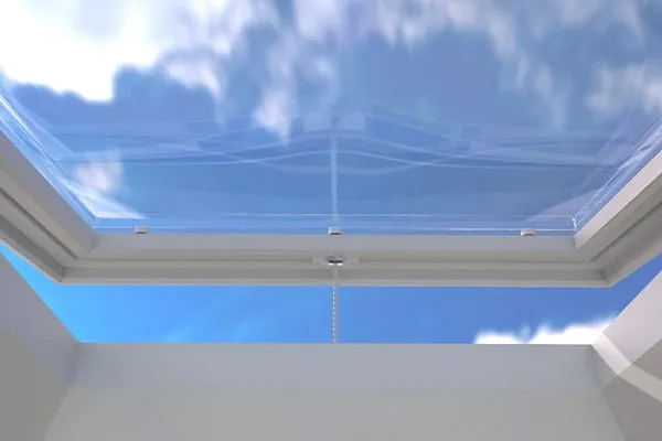 Opening rooflight bringing daylight and ventilation into a compact room