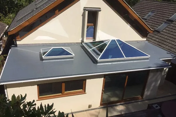 Flat roof with two pyramid roof lanterns